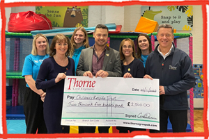 Community Champion CJ Thorne donate to the Children's Respite Trust